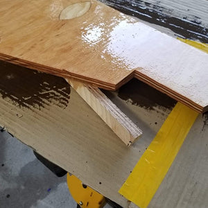 Wood wing coated with 2:1 epoxy resin kit.