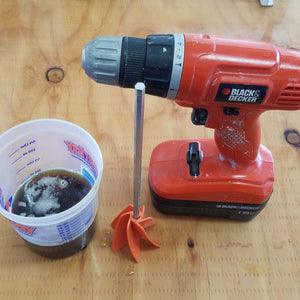 2lb Polyurethane Pour Foam in Mixing/Measuring Cup Ready to be Mixed